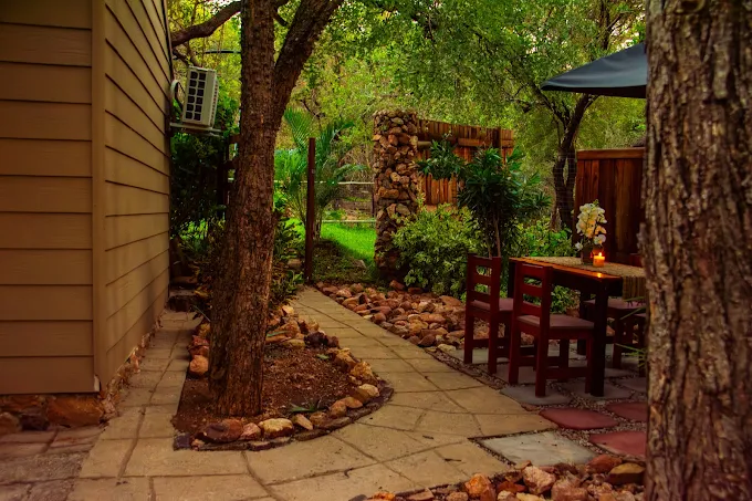 Outdoor garden patio at Imbewu Spa